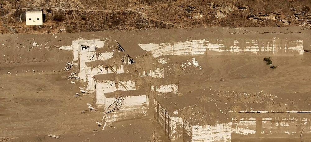 Chamoli: Damaged Dhauliganga hydropower project at Reni village, after a glacier broke off in Joshimath causing a massive flood in the Dhauli Ganga river, in Chamoli district of Uttarakhand, Sunday, Feb. 7, 2021. (PTI Photo)